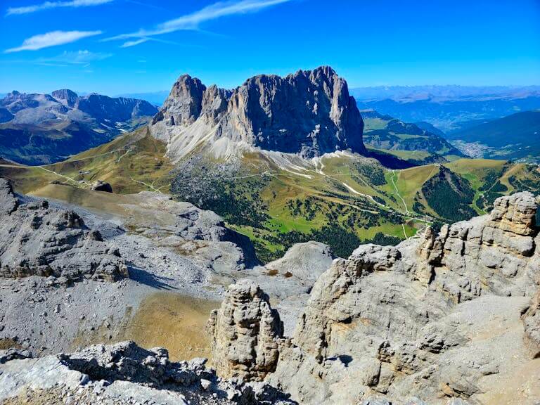 Breathtaking landscape of the Dolomite mountains under a clear blue sky.