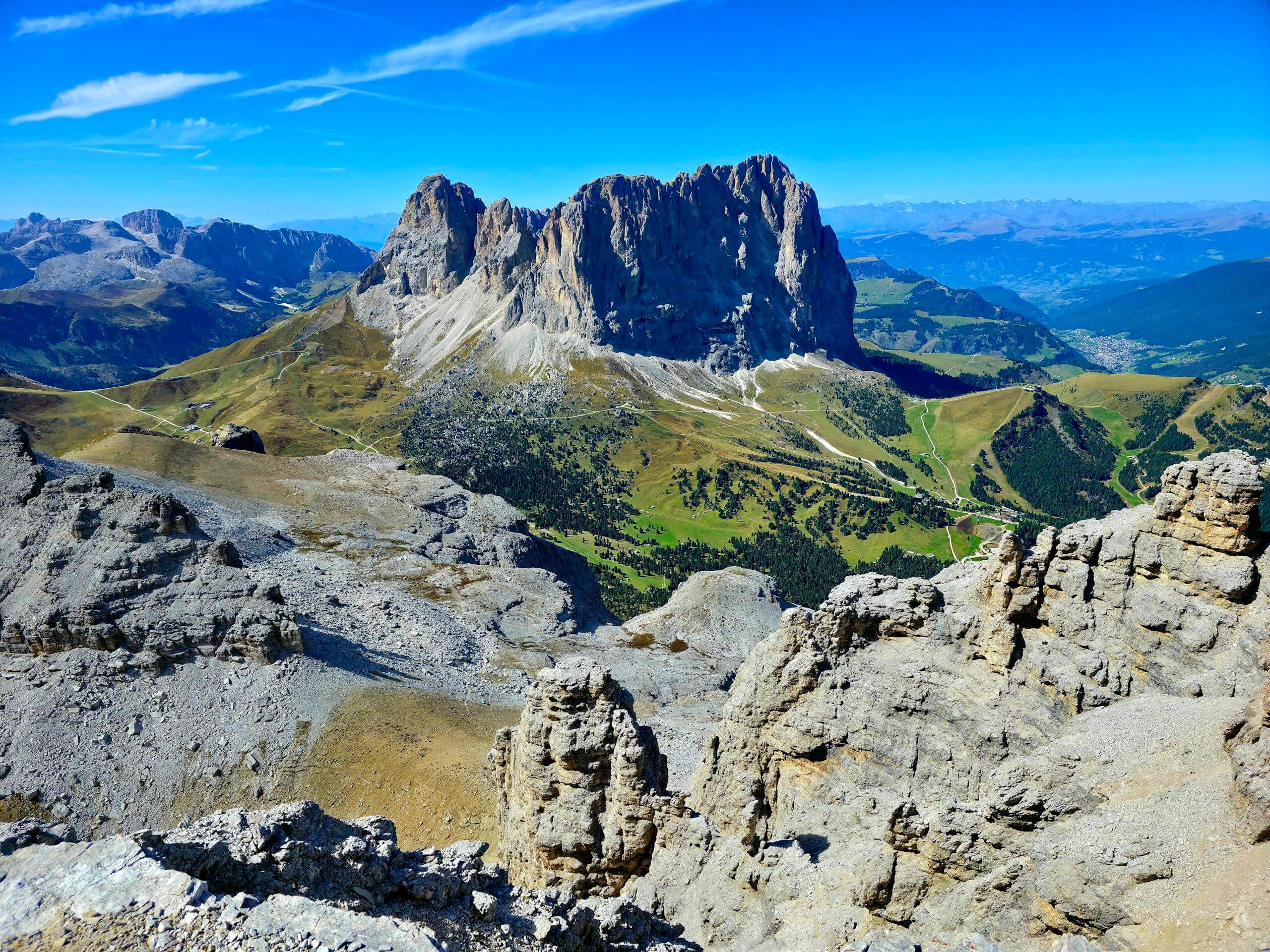 Breathtaking landscape of the Dolomite mountains under a clear blue sky.